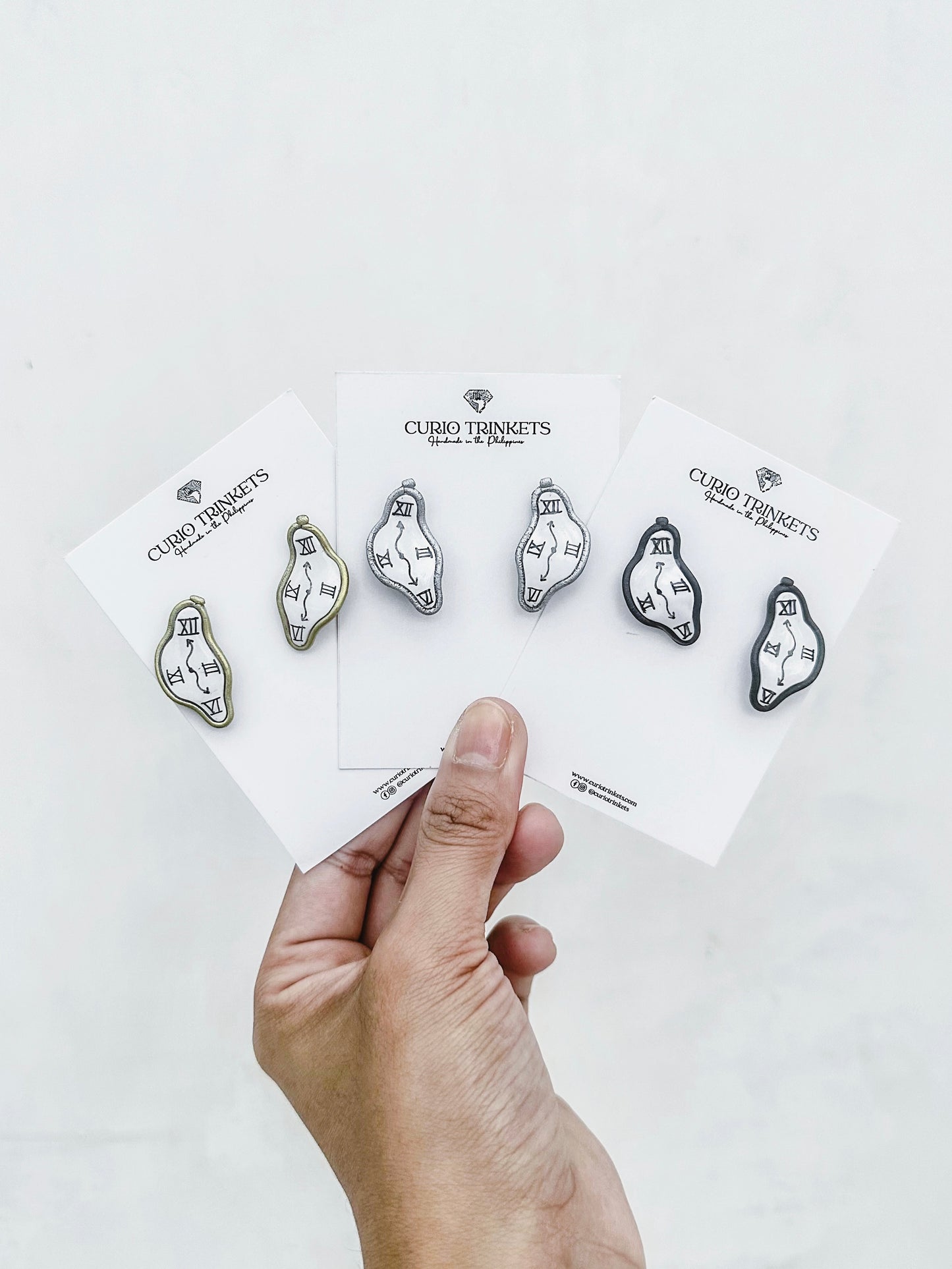 Salvador Dali's Melting Clock Studs