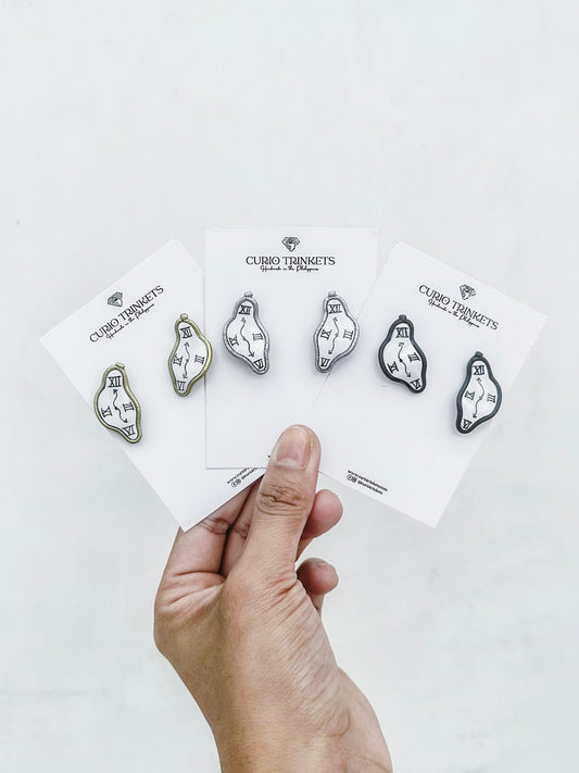 Salvador Dali's Melting Clock Studs